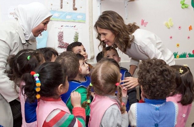 Đệ nhất phu nhân Syria: 'Bông hồng' đẹp tỏa sắc nhầm chỗ? De nhat phu nhan Syria: 'Bong hong' dep toa sac nham cho?