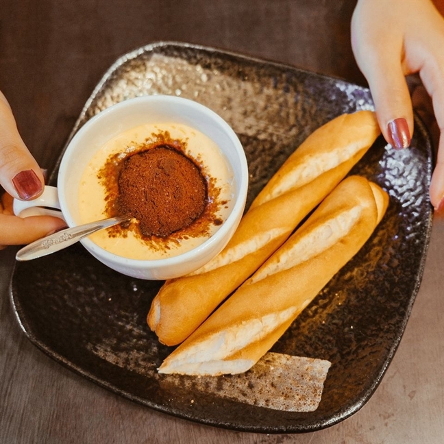 Đến 'động khỉ' ăn bánh mì milo trứng đánh kem béo ngậy Den 'dong khi' an banh mi milo trung danh kem beo ngay